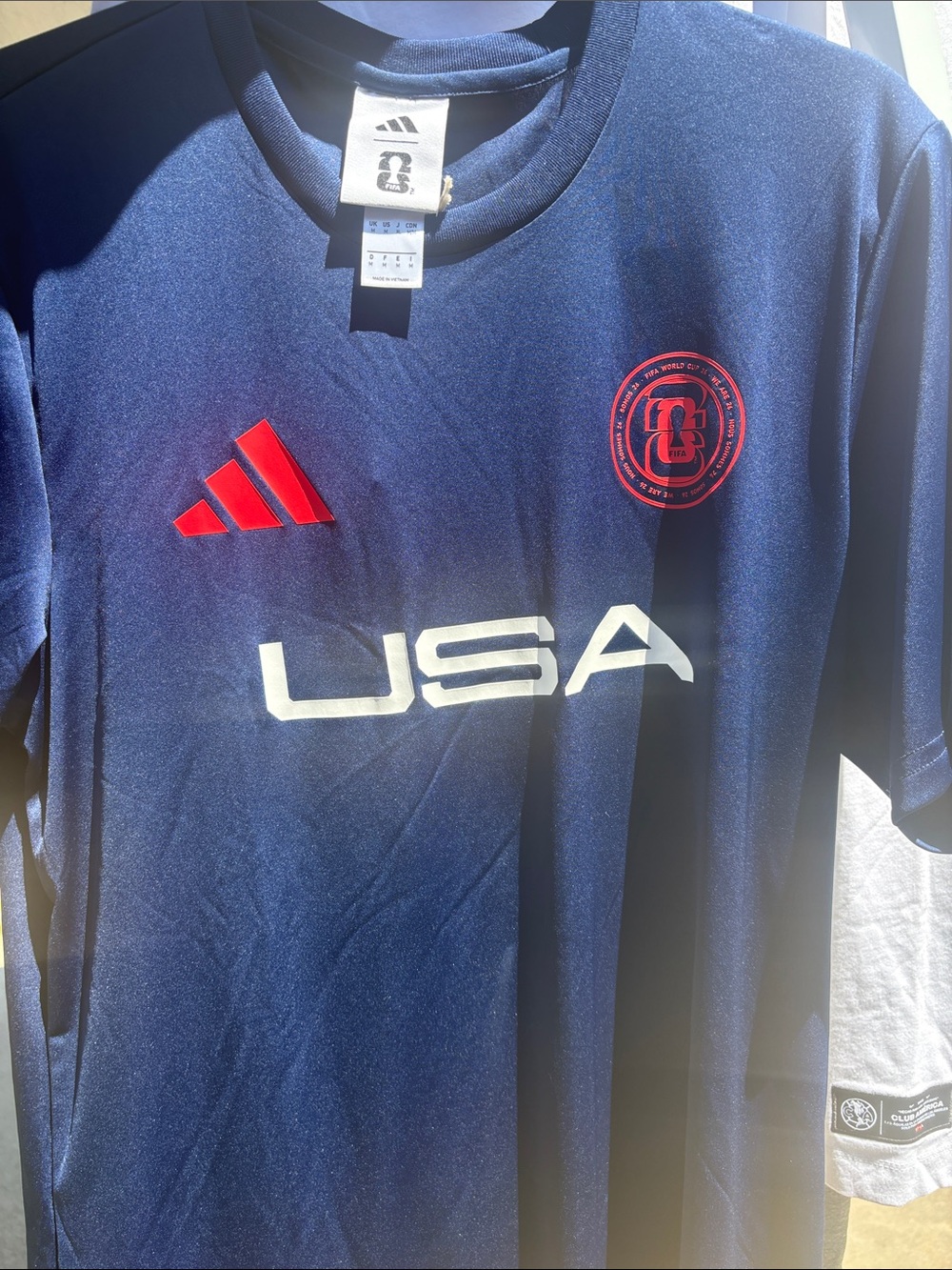adidas Navy Tee with Red Accents and White USA Print.